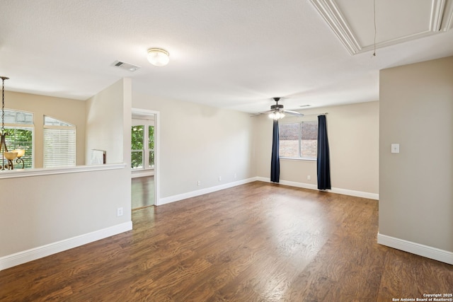 18310 Redwood Path, San Antonio, TX 78259 - empty room with attic access, healthy amount of natural light, wood finished floors, and a ceiling fan