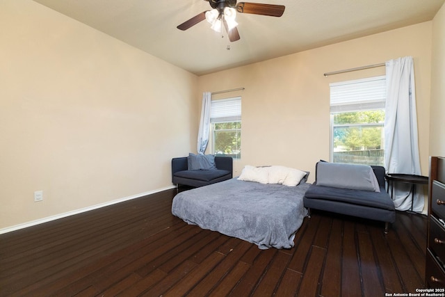 451 Tequila Rnch, San Antonio, TX 78245 - bedroom featuring wood finished floors, multiple windows, and a ceiling fan