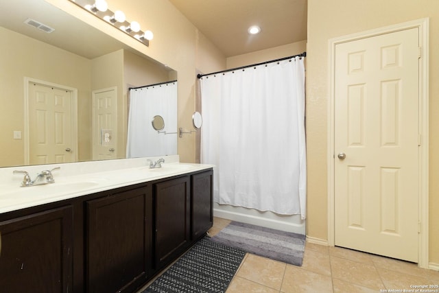 451 Tequila Rnch, San Antonio, TX 78245 - bathroom featuring double vanity, tile patterned flooring, and shower / bath combination with curtain