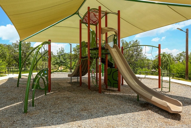 451 Tequila Rnch, San Antonio, TX 78245 - communal playground featuring view of wooded area
