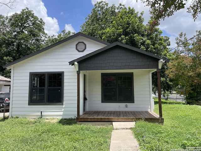 603 Humboldt, San Antonio, TX 78211 - view of front of home featuring a front yard and covered porch