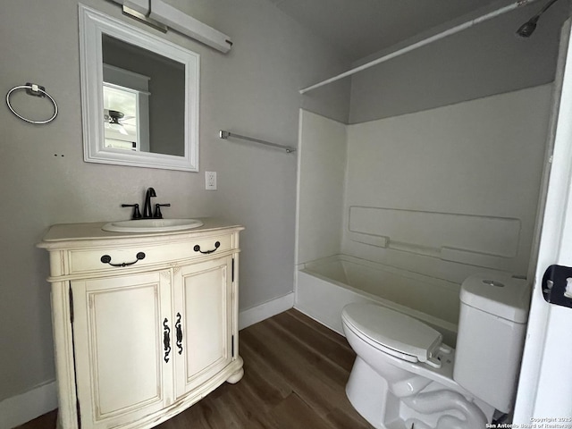 603 Humboldt, San Antonio, TX 78211 - full bathroom featuring vanity, wood finished floors, and washtub / shower combination