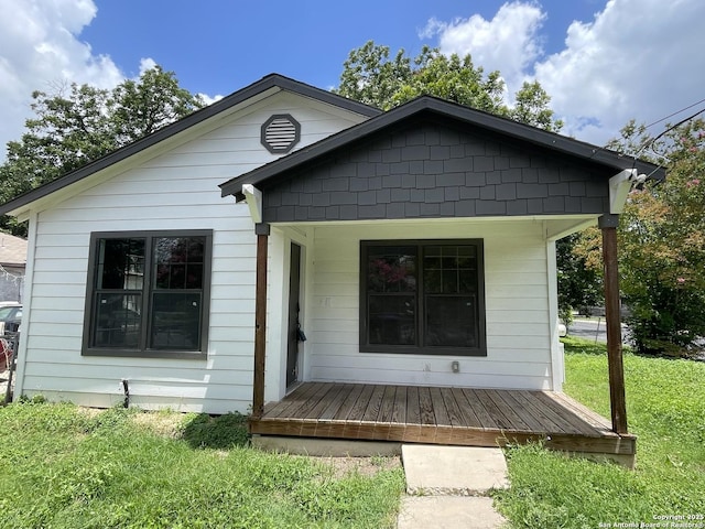 603 Humboldt, San Antonio, TX 78211 - view of front facade featuring a front lawn and covered porch