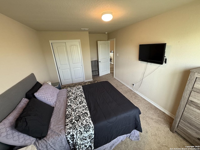 15530 Gray Catbird, San Antonio, TX 78253 - bedroom with a closet, carpet, and a textured ceiling