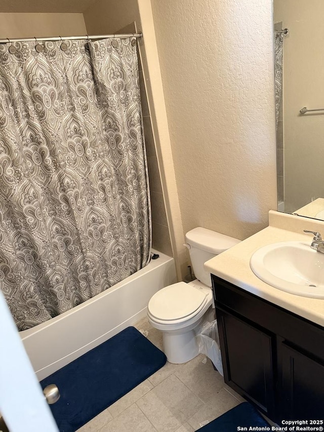 15530 Gray Catbird, San Antonio, TX 78253 - full bathroom with shower / bath combo with shower curtain, vanity, tile patterned floors, and a textured wall