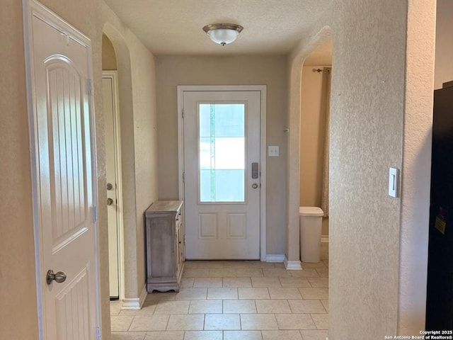 15530 Gray Catbird, San Antonio, TX 78253 - doorway featuring light tile patterned flooring and arched walkways