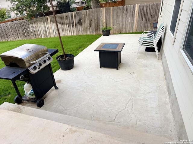 15530 Gray Catbird, San Antonio, TX 78253 - view of patio / terrace featuring a fire pit and a grill