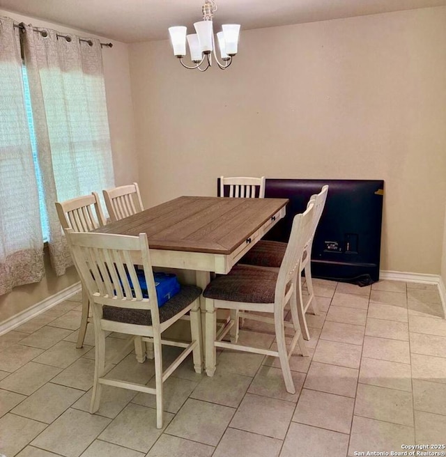 15530 Gray Catbird, San Antonio, TX 78253 - dining room with light tile patterned flooring and a chandelier