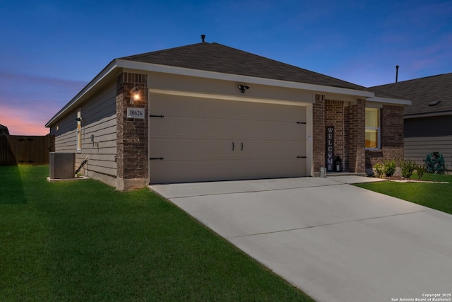 10626 Erinita, Converse, TX 78109 - single story home with a garage, concrete driveway, and a front yard