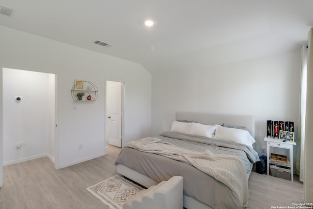 10626 Erinita, Converse, TX 78109 - bedroom featuring light wood-style flooring, vaulted ceiling, and recessed lighting