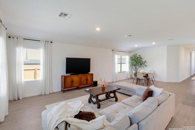 10626 Erinita, Converse, TX 78109 - living room with light wood finished floors and recessed lighting