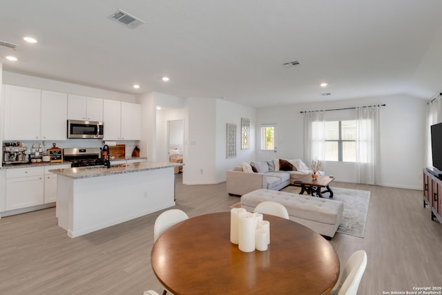 10626 Erinita, Converse, TX 78109 - dining room with light wood-style flooring and recessed lighting
