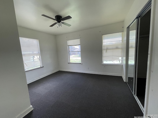 231 Carroll, San Antonio, TX 78225 - unfurnished room featuring baseboards and a ceiling fan