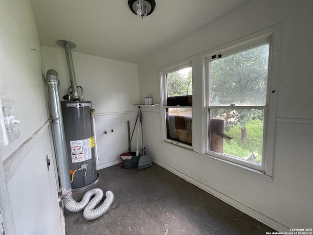 231 Carroll, San Antonio, TX 78225 - utility room featuring gas water heater