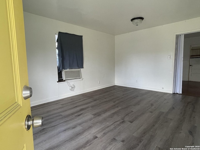 231 Carroll, San Antonio, TX 78225 - empty room featuring cooling unit and dark wood-type flooring