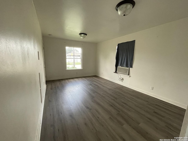 231 Carroll, San Antonio, TX 78225 - unfurnished room featuring dark wood-style flooring and cooling unit