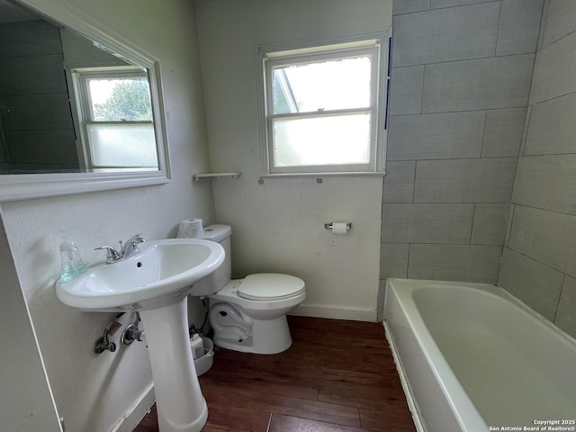 231 Carroll, San Antonio, TX 78225 - full bath featuring wood finished floors and a tub to relax in