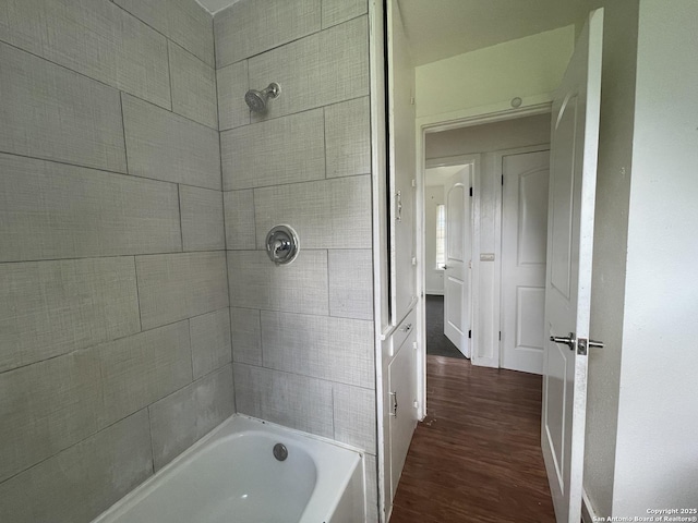 231 Carroll, San Antonio, TX 78225 - bathroom with wood finished floors and bathing tub / shower combination
