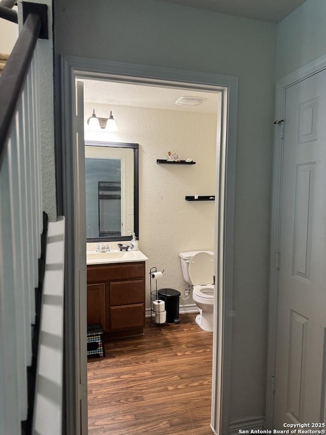 1038 Loma Mesa, San Antonio, TX 78214 - bathroom with vanity and wood finished floors