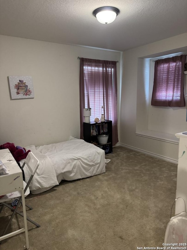 1038 Loma Mesa, San Antonio, TX 78214 - carpeted bedroom with a textured ceiling