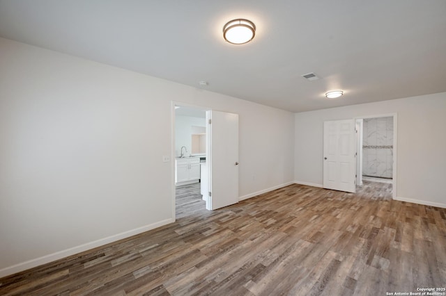 9818 Balanced Rock, Converse, TX 78109 - empty room featuring wood finished floors and baseboards