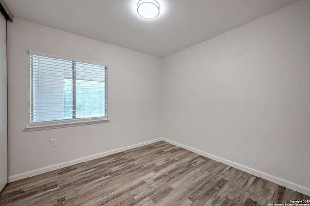 9818 Balanced Rock, Converse, TX 78109 - unfurnished room with wood finished floors and baseboards