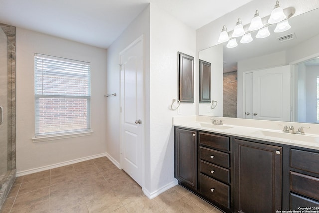 20131 Silver, San Antonio, TX 78259 - bathroom with double vanity and tile patterned flooring