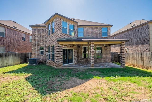 20131 Silver, San Antonio, TX 78259 - back of property featuring brick siding, a fenced backyard, and a patio
