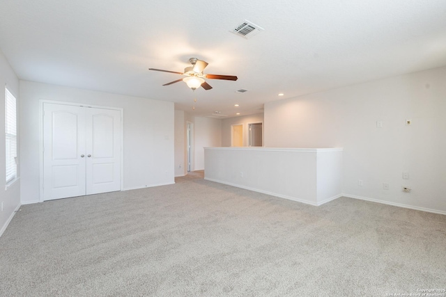 20131 Silver, San Antonio, TX 78259 - unfurnished living room with a ceiling fan, light colored carpet, and recessed lighting