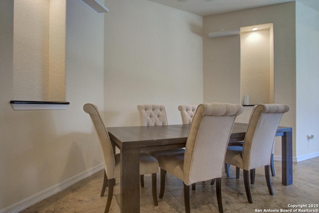 3915 Bacall, Converse, TX 78109 - tiled dining space with baseboards
