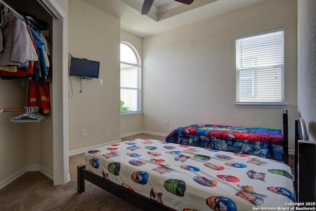3915 Bacall, Converse, TX 78109 - bedroom with carpet flooring, a closet, and ceiling fan