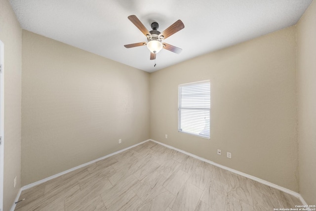 5715 Sendero Spg, San Antonio, TX 78251 - empty room with ceiling fan and baseboards