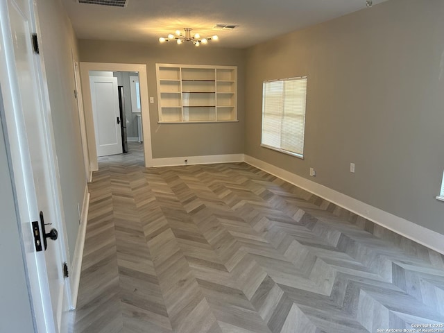 635 E Gonzales, Seguin, TX 78155 - spare room with a chandelier and baseboards
