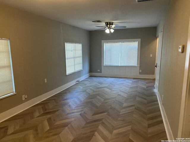 635 E Gonzales, Seguin, TX 78155 - empty room with a ceiling fan and baseboards