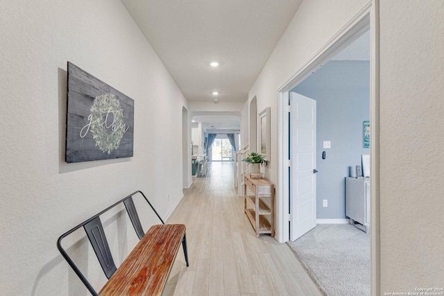 29949 Premiere, Bulverde, TX 78163 - corridor featuring light wood-type flooring, recessed lighting, and a textured wall