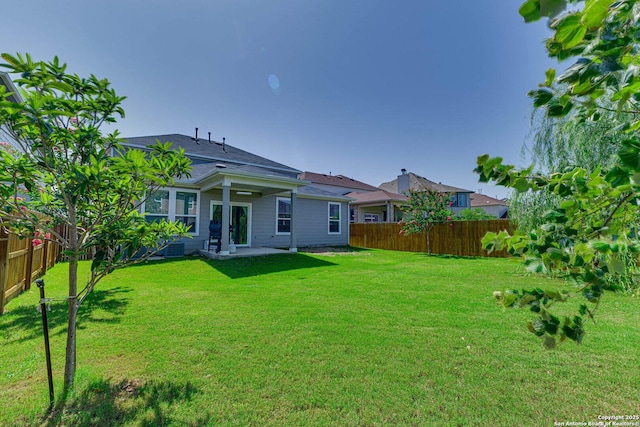 29949 Premiere, Bulverde, TX 78163 - rear view of property featuring a fenced backyard, a patio, and roof with shingles