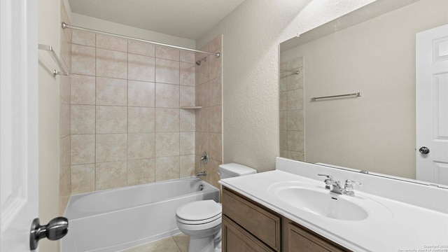 12618 Ozona Rnch, San Antonio, TX 78245 - bathroom featuring vanity,  shower combination, tile patterned floors, and a textured wall