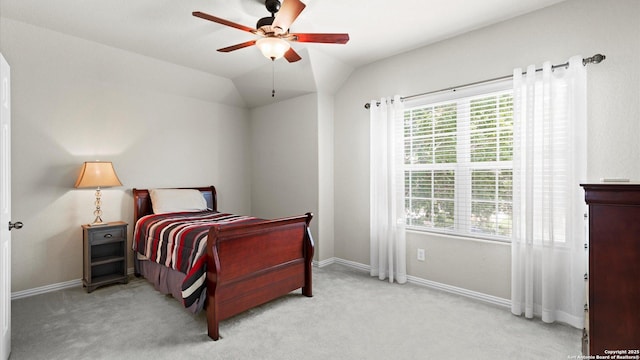 12618 Ozona Rnch, San Antonio, TX 78245 - carpeted bedroom with multiple windows, vaulted ceiling, and a ceiling fan