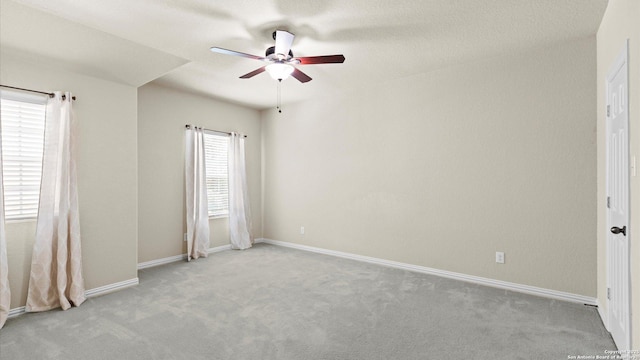 12618 Ozona Rnch, San Antonio, TX 78245 - carpeted empty room with a ceiling fan and baseboards
