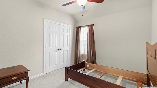 12618 Ozona Rnch, San Antonio, TX 78245 - bedroom with light carpet, a closet, lofted ceiling, and ceiling fan