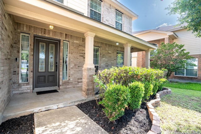 9534 Anderson Way, Converse, TX 78109 - doorway to property with a porch and brick siding