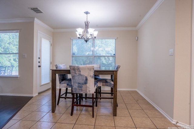 9534 Anderson Way, Converse, TX 78109 - dining space with a chandelier, crown molding, and light tile patterned floors