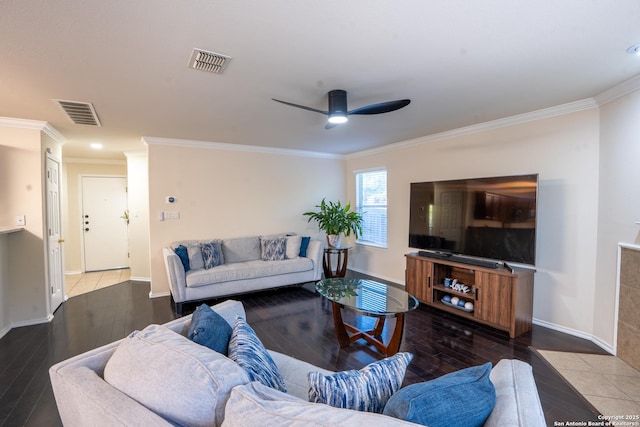 9534 Anderson Way, Converse, TX 78109 - living area featuring wood finished floors, ornamental molding, and ceiling fan