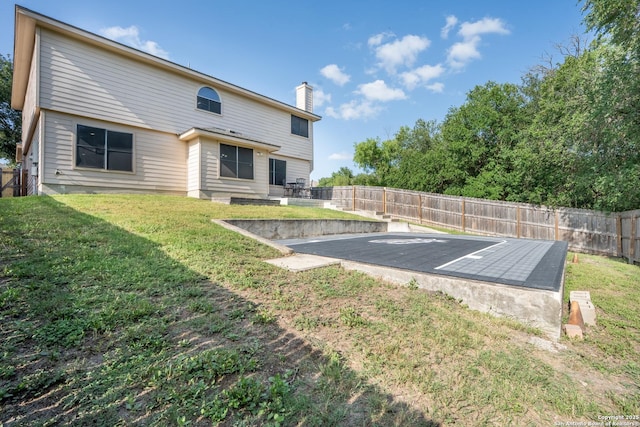 9534 Anderson Way, Converse, TX 78109 - rear view of property featuring a chimney and a fenced backyard