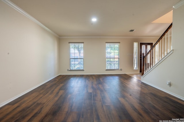 9534 Anderson Way, Converse, TX 78109 - unfurnished living room with dark wood finished floors, crown molding, and stairway