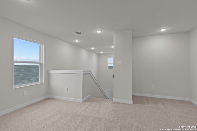 9962 Forestier Grn, San Antonio, TX 78214 - below grade area with light carpet and recessed lighting