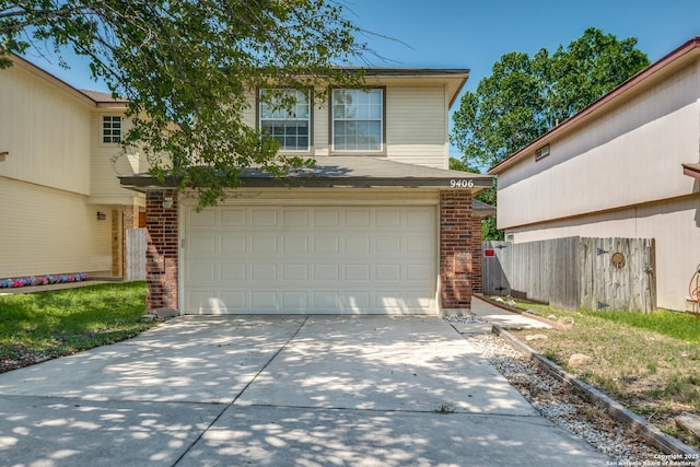 9406 Gillcross, San Antonio, TX 78250 - traditional home with brick siding, an attached garage, and concrete driveway