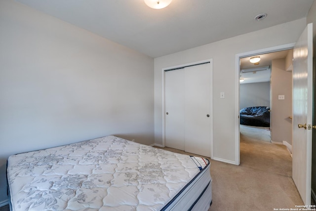 9406 Gillcross, San Antonio, TX 78250 - bedroom with light colored carpet and a closet