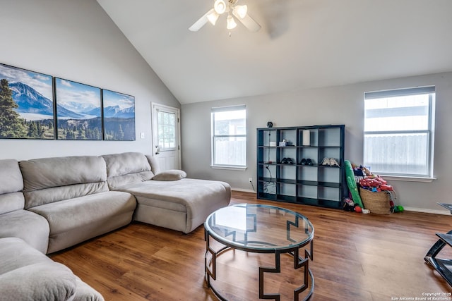9406 Gillcross, San Antonio, TX 78250 - living area featuring ceiling fan, vaulted ceiling, and wood finished floors