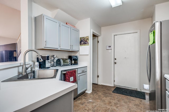 9406 Gillcross, San Antonio, TX 78250 - kitchen with freestanding refrigerator, dishwashing machine, and light countertops